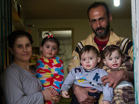 Flüchtlingsfamilie / Caritas