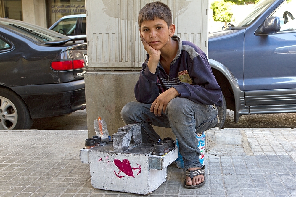 Kleiner syrischer Schuheputzer in Beirut / © Stephan Rebernit, flickr