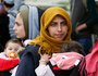 Flüchtlinge am 19. Oktober 2015 im Transitlager nahe dem griechischen Idomeni an der mazedonischen Grenze. Bild: Frauen mit Kindern.