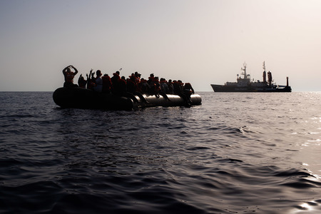 At the first light on August 23, the Sea-Watch 4 morning look out spotted a small black vessel in international waters, some 31 nautical miles from the coast of Libya. The overcrowded and unseaworthy rubber boat carried 60 men and women, as well as 9