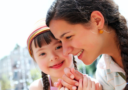 Happy family moments - Mother and child have a fun.